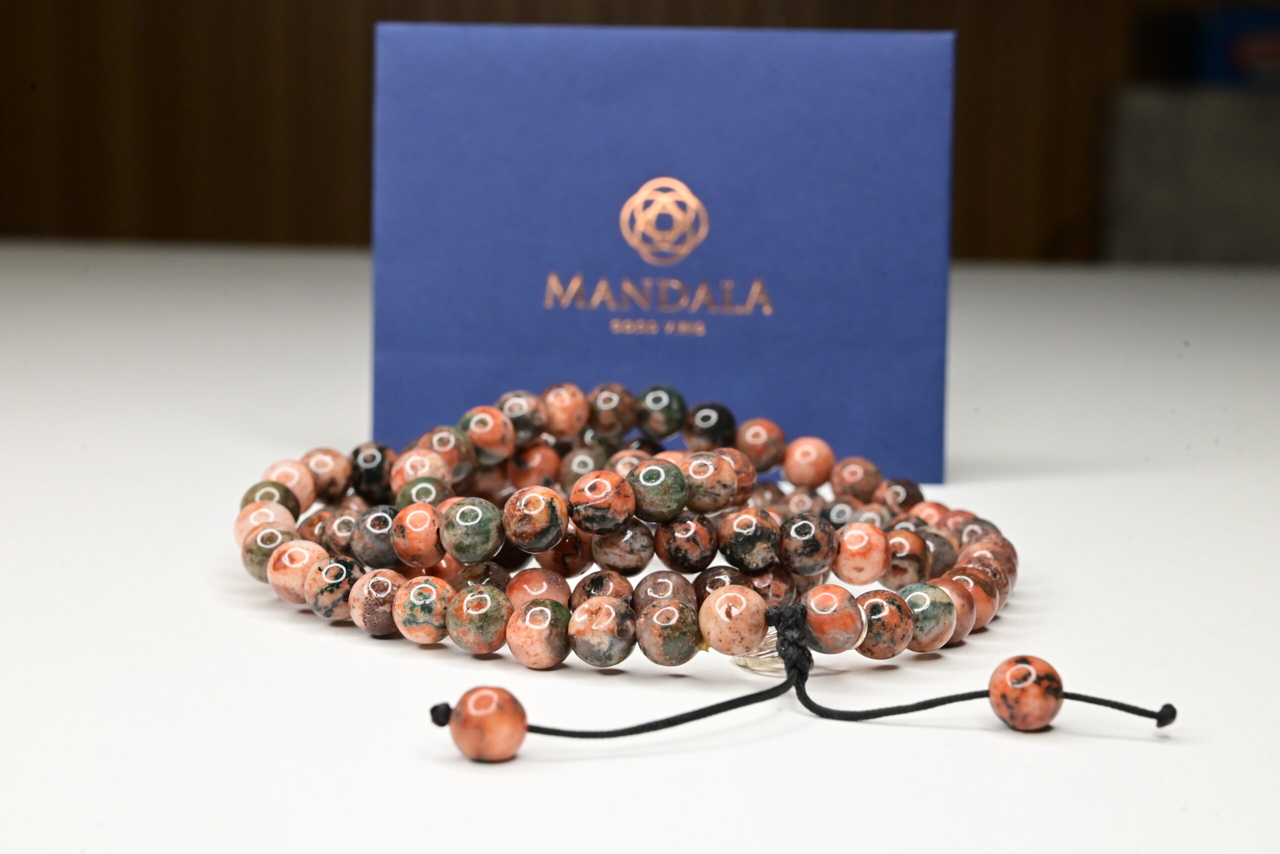 "Enhances Your Aura And Importance Amongst Other Powerful People " MANDALA™ Fire Agate is commonly used for Chakra (energy point) healing. It is a proven earth-piece that boosts your confidence and helps you shine in the crowd. Popularly known as the stone of gut, MANDALA™ Fire Agate is best for the people who feel less confident amongst other powerful people. The Science Behind MANDALA™ Fire Agate Gemstones and living beings are the only two creations that have all the five elements of the universe in them. It is scientifically observed that gemstones also contribute to the transfer to energy like humans. MANDALA™ Fire Agate attracts relevant energy from the universe and gives it to the gut chakra. The continuous flow of energy in the gut promotes grounding effect, which boosts the sense of importance and creates a psychic shield that deflects negativity and inner doubts.